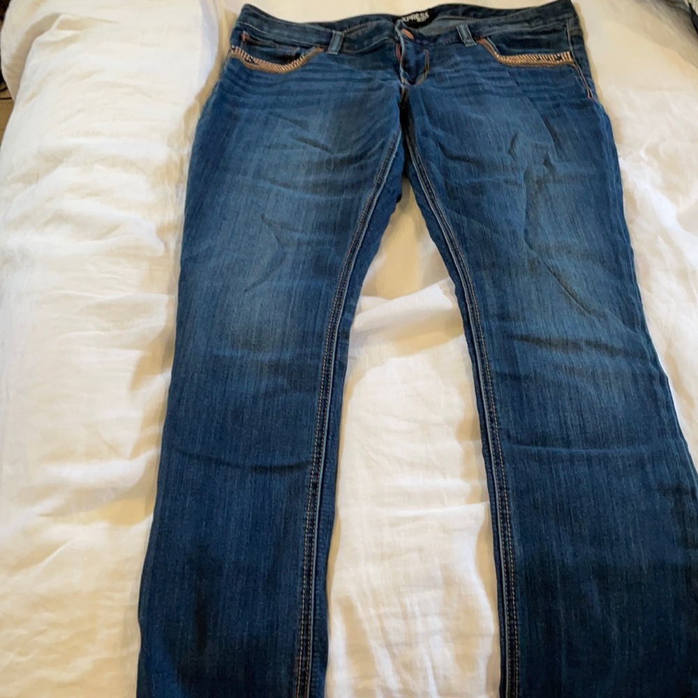 Express straight leg denim with stud pocket detail